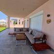 Picture of outdoor-wooden-l-shaped-sectional-sofa-set-with-glass-top-coffee-table